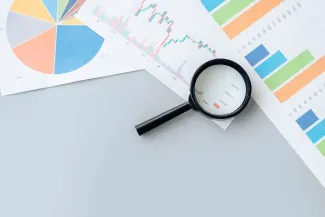 Magnifying glass rests on a table