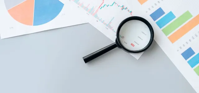 Magnifying glass rests on a table